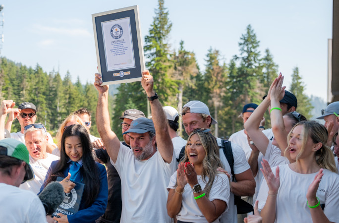 Organizers celebrating with their certificate