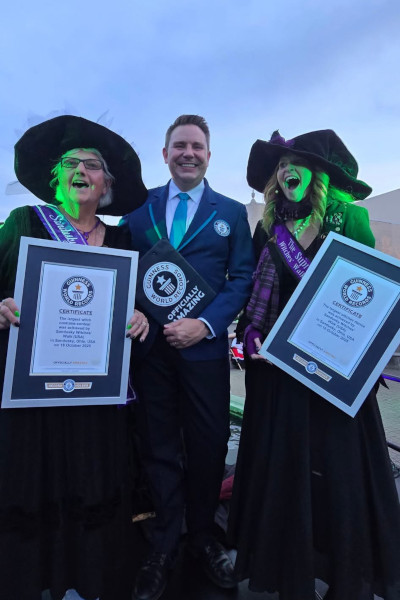 Michael with event organizers and GWR certificates