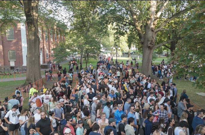 The crowd queuing for pizza