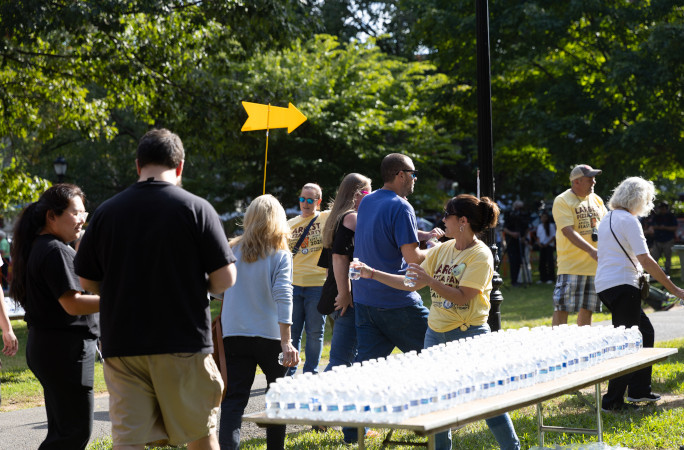 Volunteers handing out waters