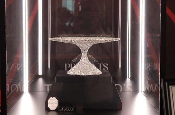 cake stand presented in a window display