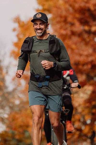 Mark running while smiling