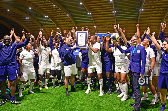 Players kissing the GWR certificate