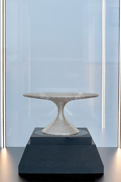 close up of stand made out of swarovski crystals placed in a window display