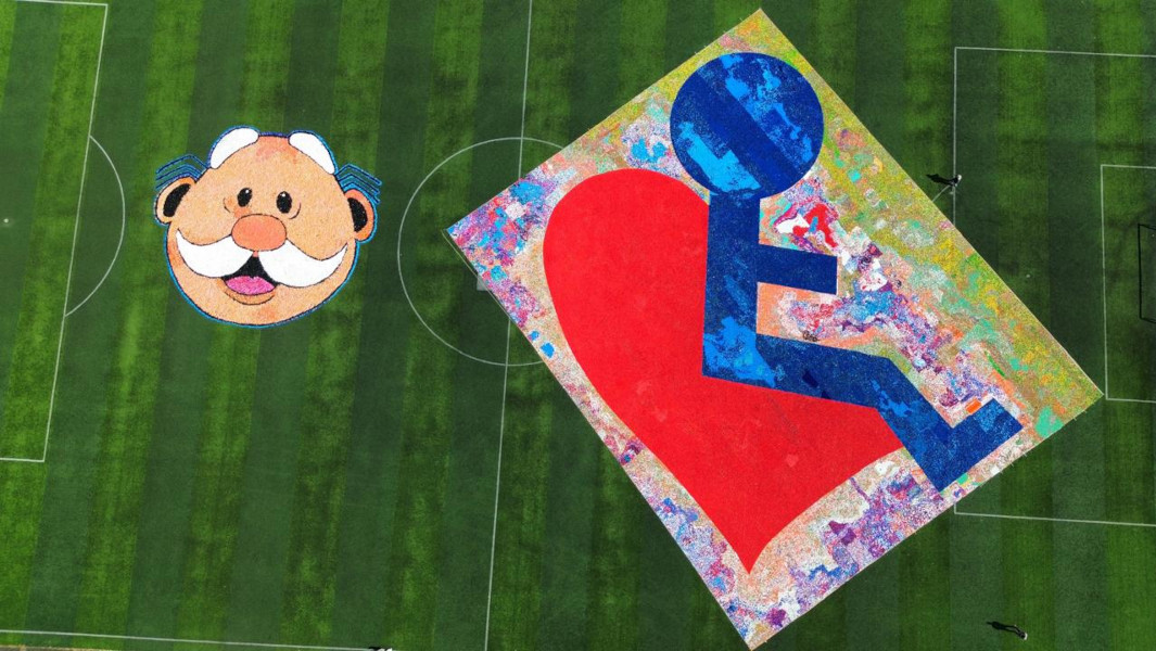 The largest mosaic of a wheelchair with a heart