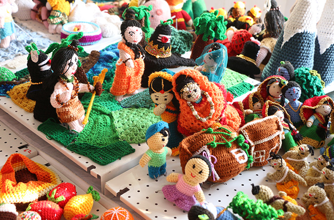 crochet sculptures in the shape of human figures