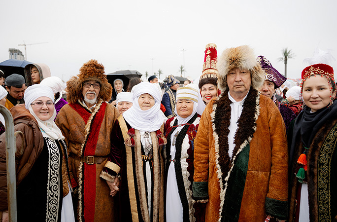 people dressed in fur and pattern clothing 