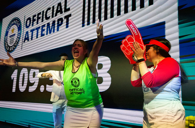Woman cheering on stage