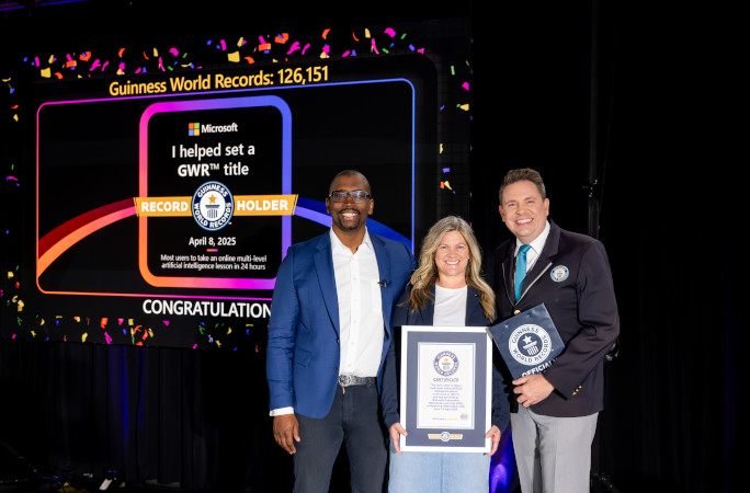 Leadership team with record-breaking background