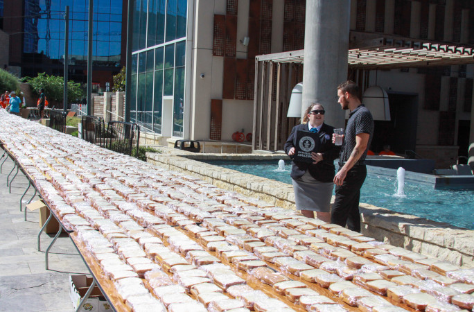 Adjudicator inspecting the sandwich line