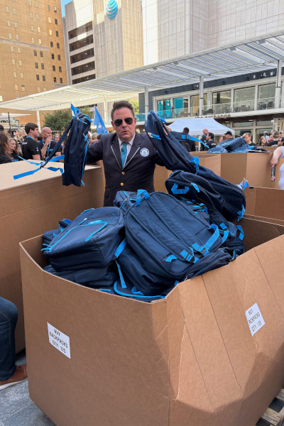 Adjudicator holding up the bags