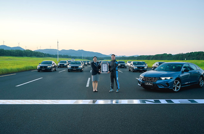 Adjudicator giving the driver a certificate