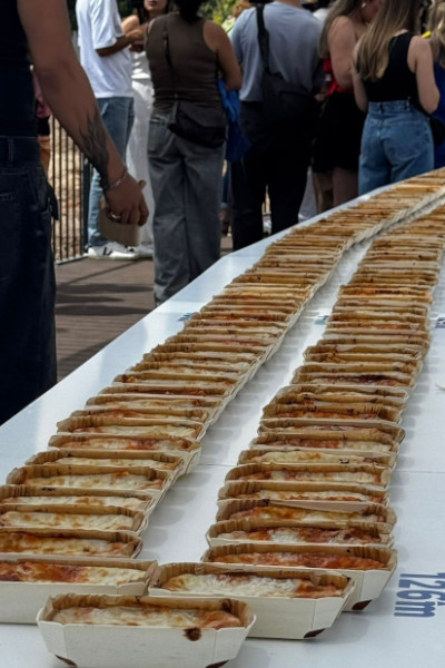 People lining up for their lasagne