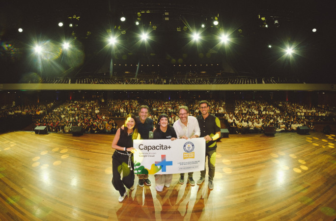 The Capacita banner with the audience