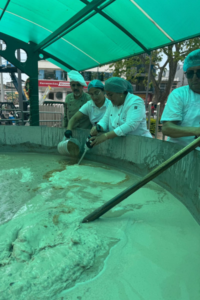 Workers stirring the hot chocolate
