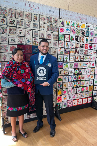 Alfredo posing with an embroiderer