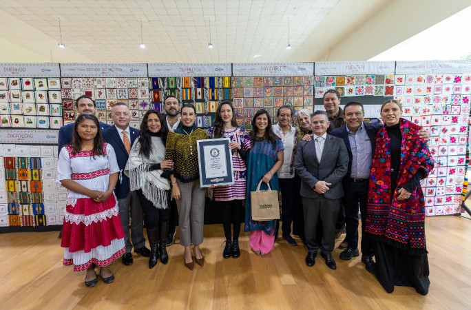 Group posing with the certificate