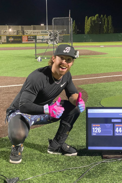 Will posing with the record speedometer on the field