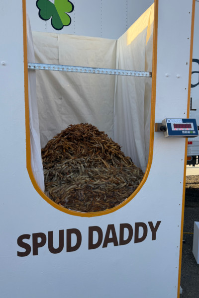 French fries in the Spud Daddy container being weighed