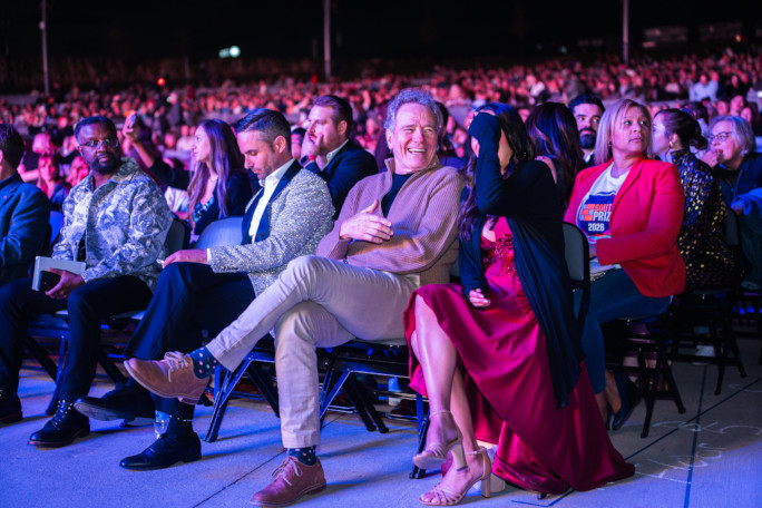 Bryan Cranston sitting in the crowd