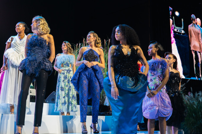 Models looking left onstage