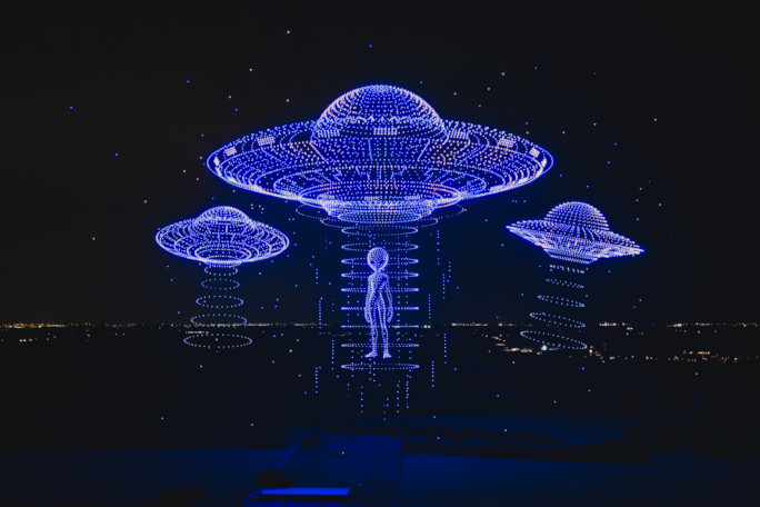 Drones forming the image of two astronauts