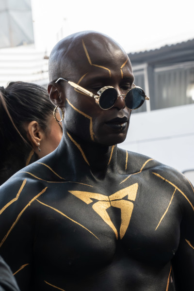 A body painted man with cool glasses