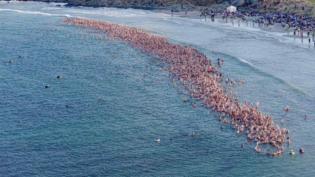 Drone photo of everyone in the water during the largest polar bear dip