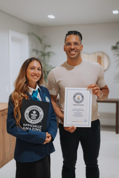 Joel and the Adjudicator with his certificate