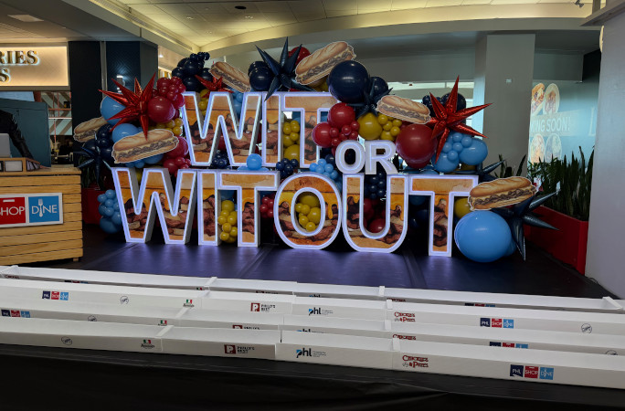Wit or Witout sign at the Philly airport
