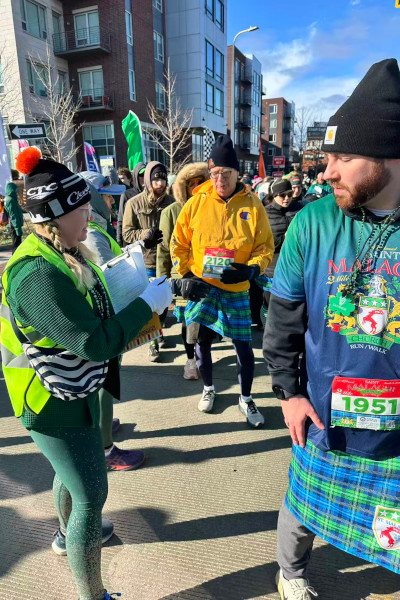 Volunteers checking out the kilts