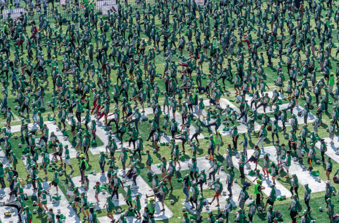 Closeup of the crowd in green shirts