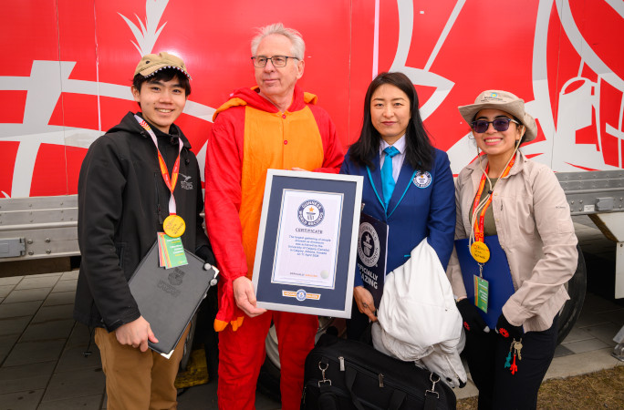 Event organizers with their certificate