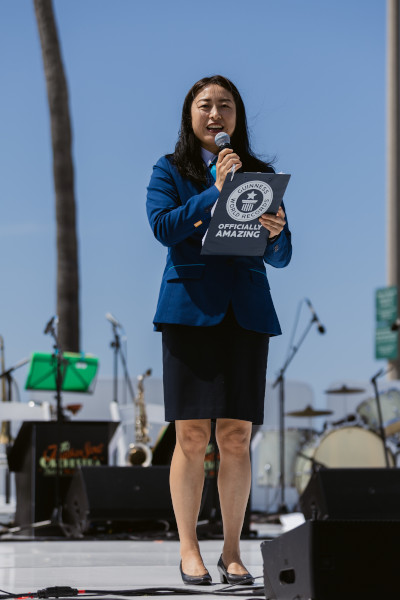 Adjudicator Tina Shi onstage at the event