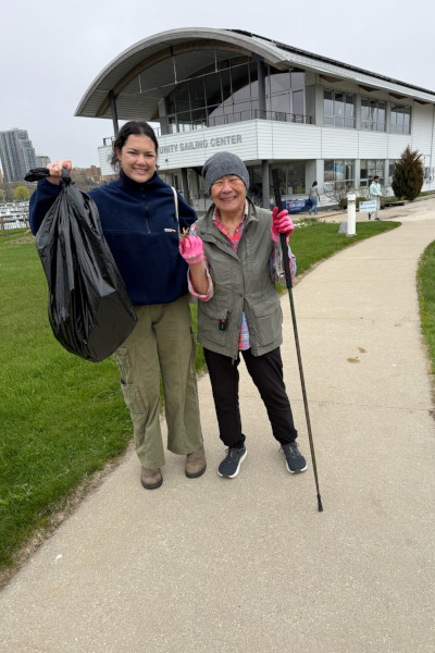An older and younger woman smiling at the event