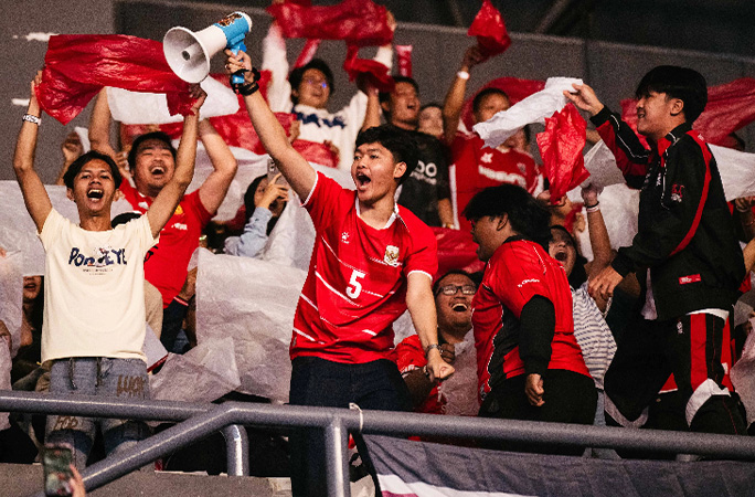 people who took part in the sports event cheering