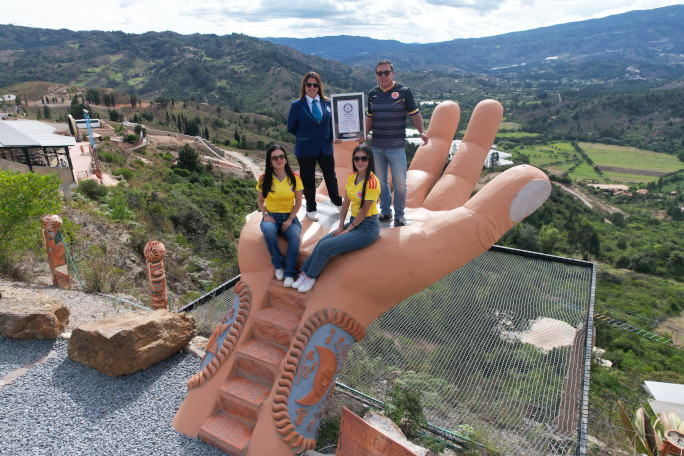 Adjudicator atop a hand at the park with scenic views of the mountains
