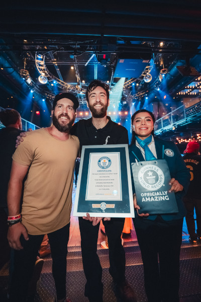 Adjudicator with GWR certificate and two event organizers