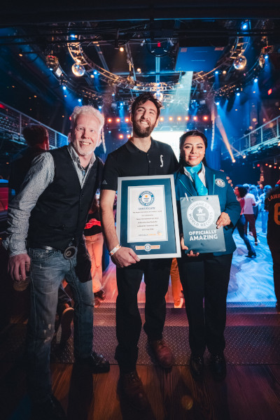 Adjudicator with GWR certificate, Max Foster, and another organizer