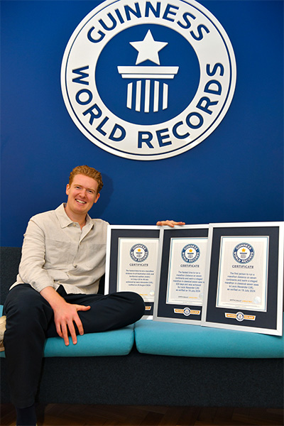 louis with his three guinness world records certificates