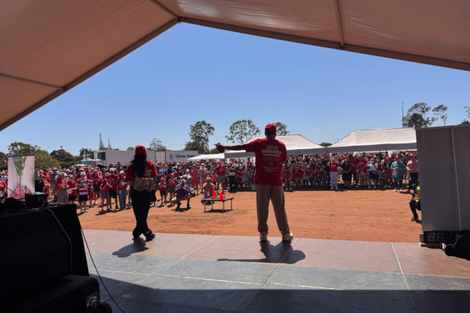 Organizers announcing something onstage