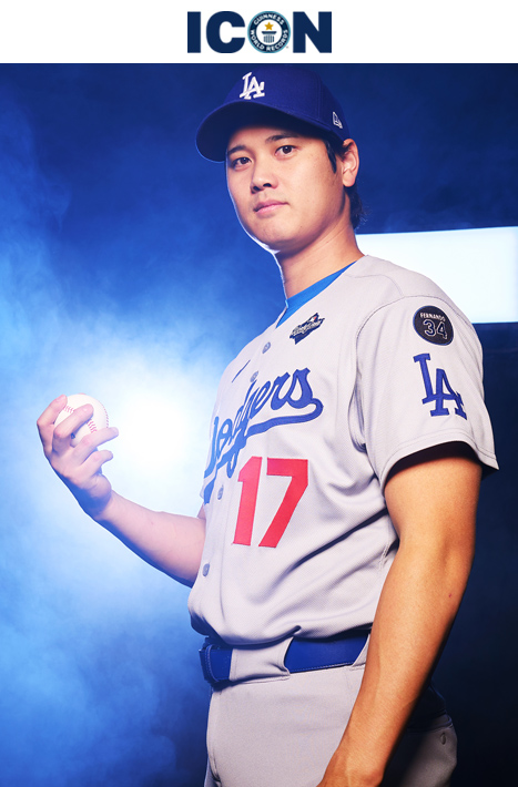 Shohei in baseball kit holding baseball