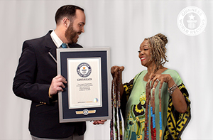 Diana looking at certificate