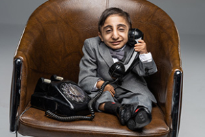 Shortest man talking over the phone