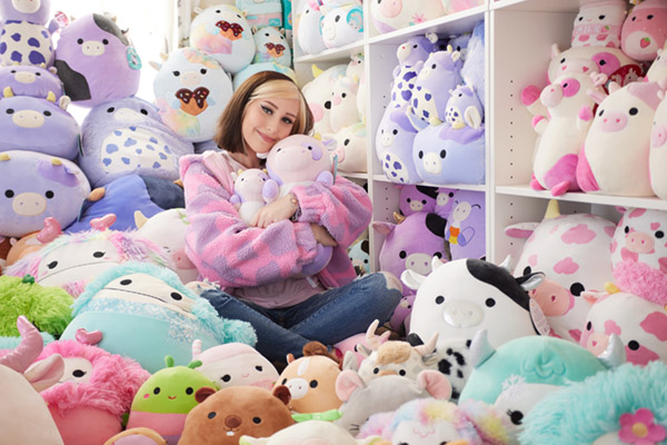 Sabrina hugging squishmallows