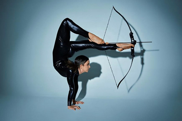 Record holder shooting arrow