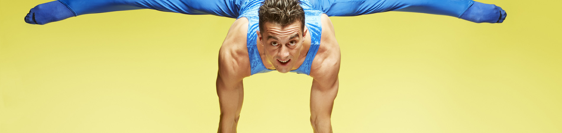 Yellow background contortionist