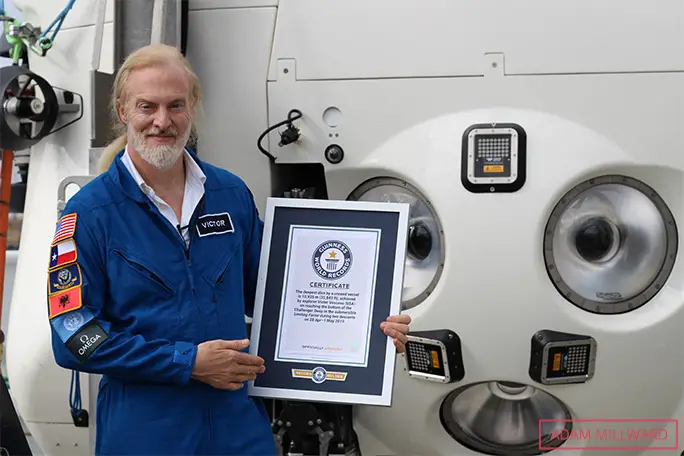Victor Vescovo smiling with cert