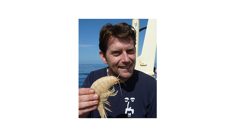marine-biologist-alan-jamieson-holding-the-largest-amphipod