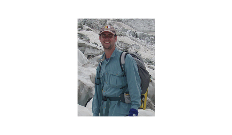 Glaciologist Professor Chris Stokes on a glacier